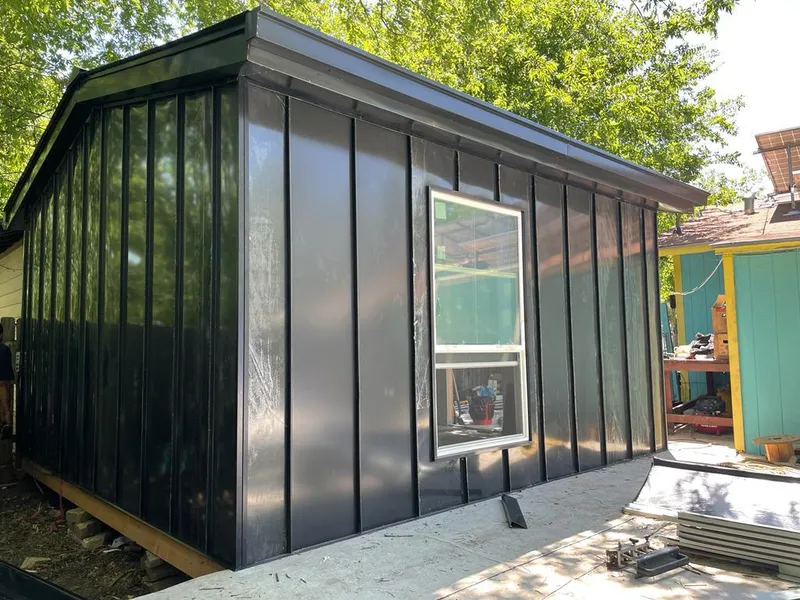 Black standing seam metal wall panels for Roof Inspection in Hanahan